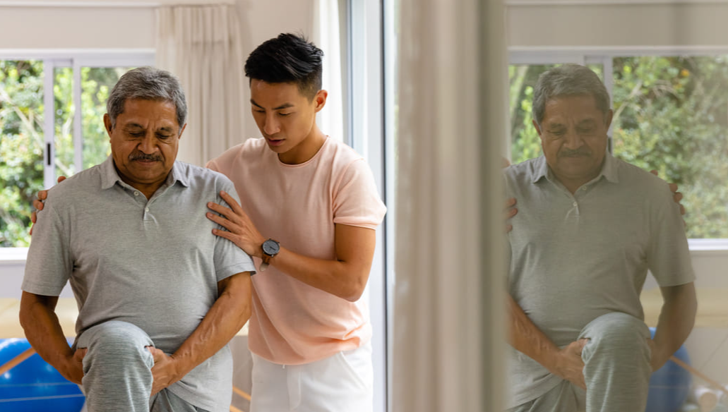 diverse-male-physiotherapist-advising-senior-male-patient-stretching-leg-physiotherapy-healthcare-wellbeing-senior-lifestyle-unaltered-(1)-(1)